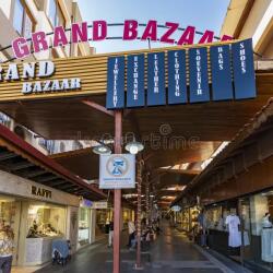 kusadasi-aydin-â-tr-oct-grand-bazaar-bustling-market-filled-colorful-shops-offering-turkish-rugs-ceramics-352775253